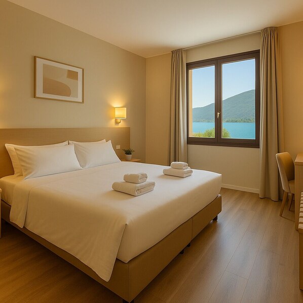 Economy Room, Lake View | Premium bedding, down duvets, in-room safe, desk - Hotel Roè Garda (Roe Volciano)
