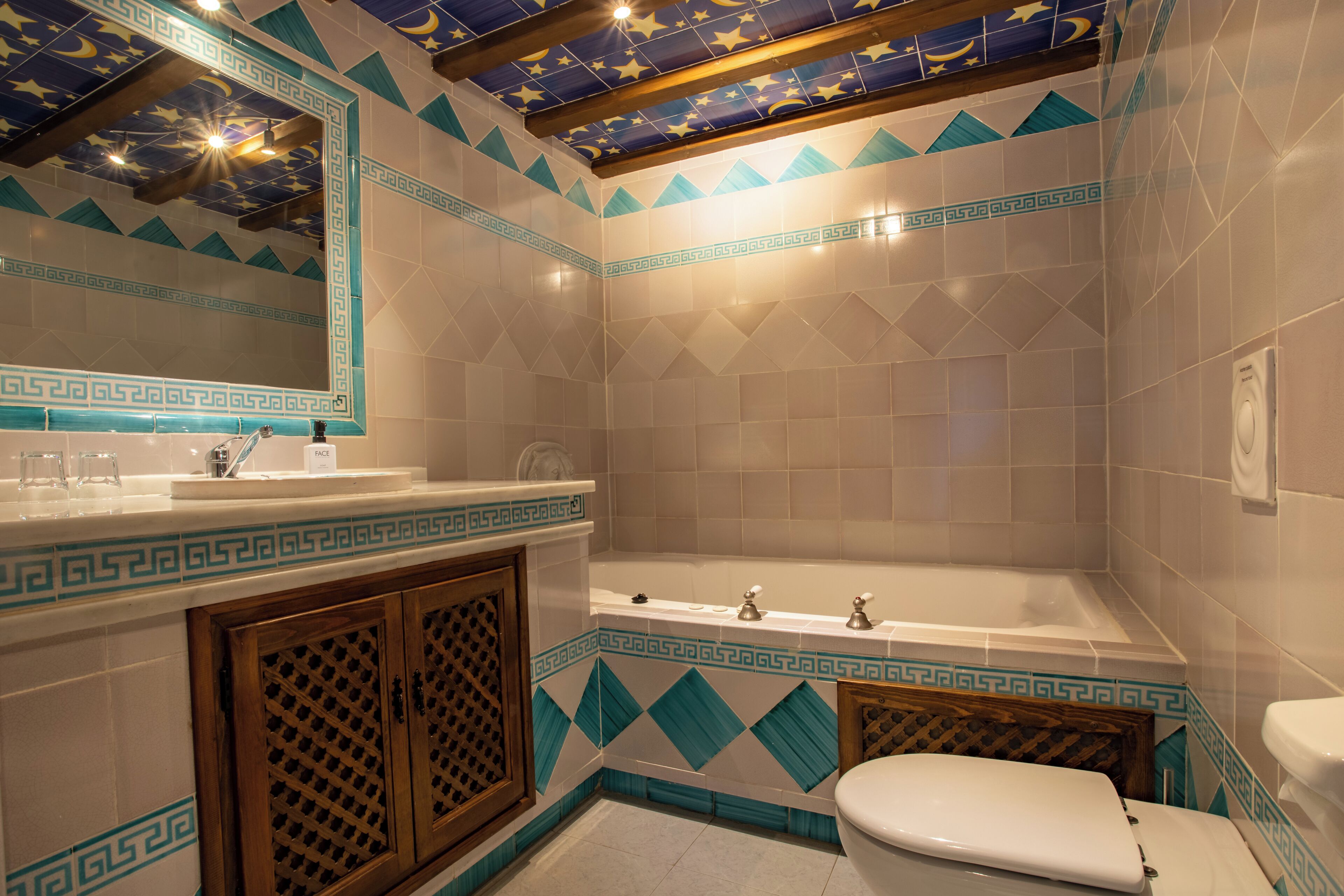 rainfall showerhead, eco-friendly toiletries, hair dryer, towels