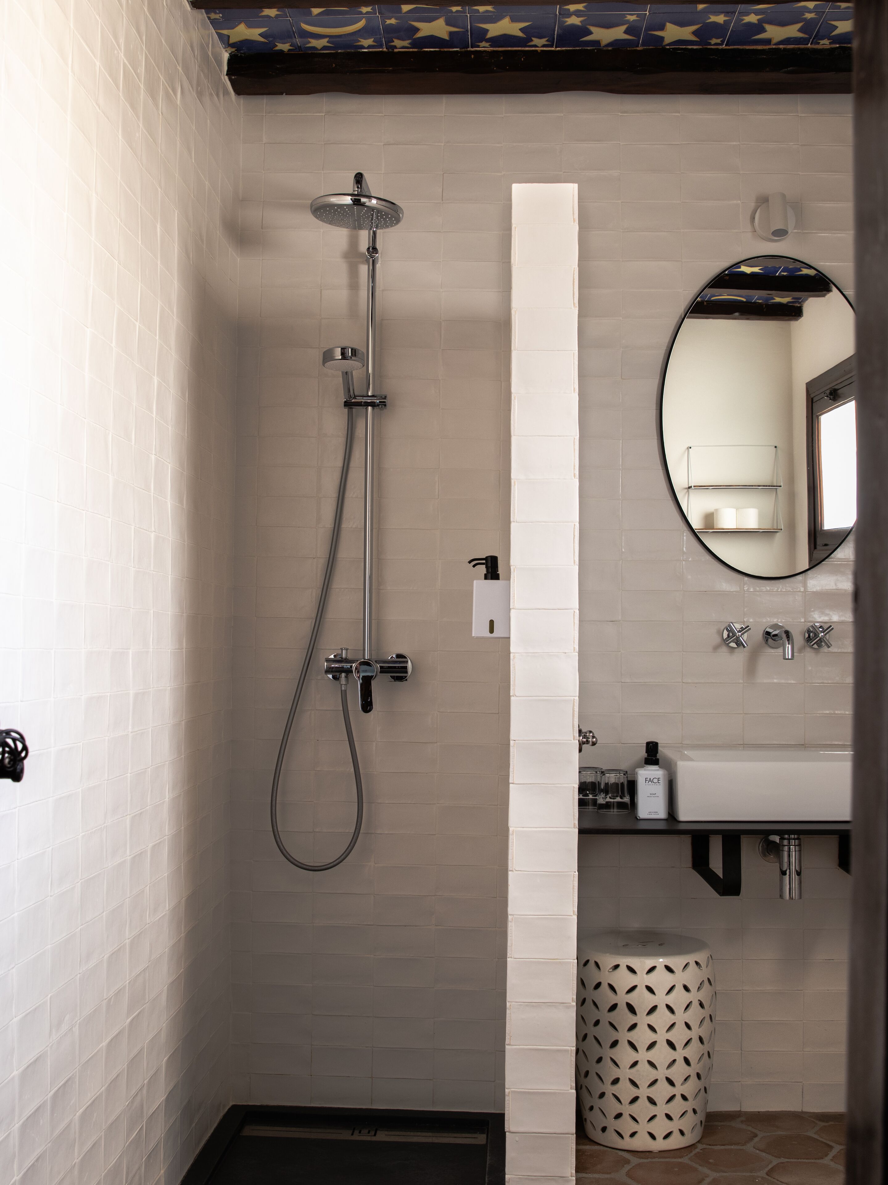 standard double room | bathroom | rainfall showerhead, eco-friendly toiletries, hair dryer, towels
