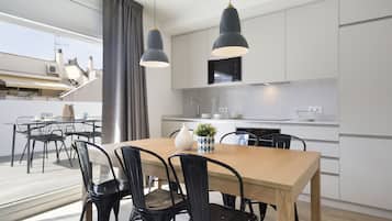 Design Penthouse, 2 Bedrooms, City View | Private kitchen | Full-sized fridge, microwave, oven, stovetop