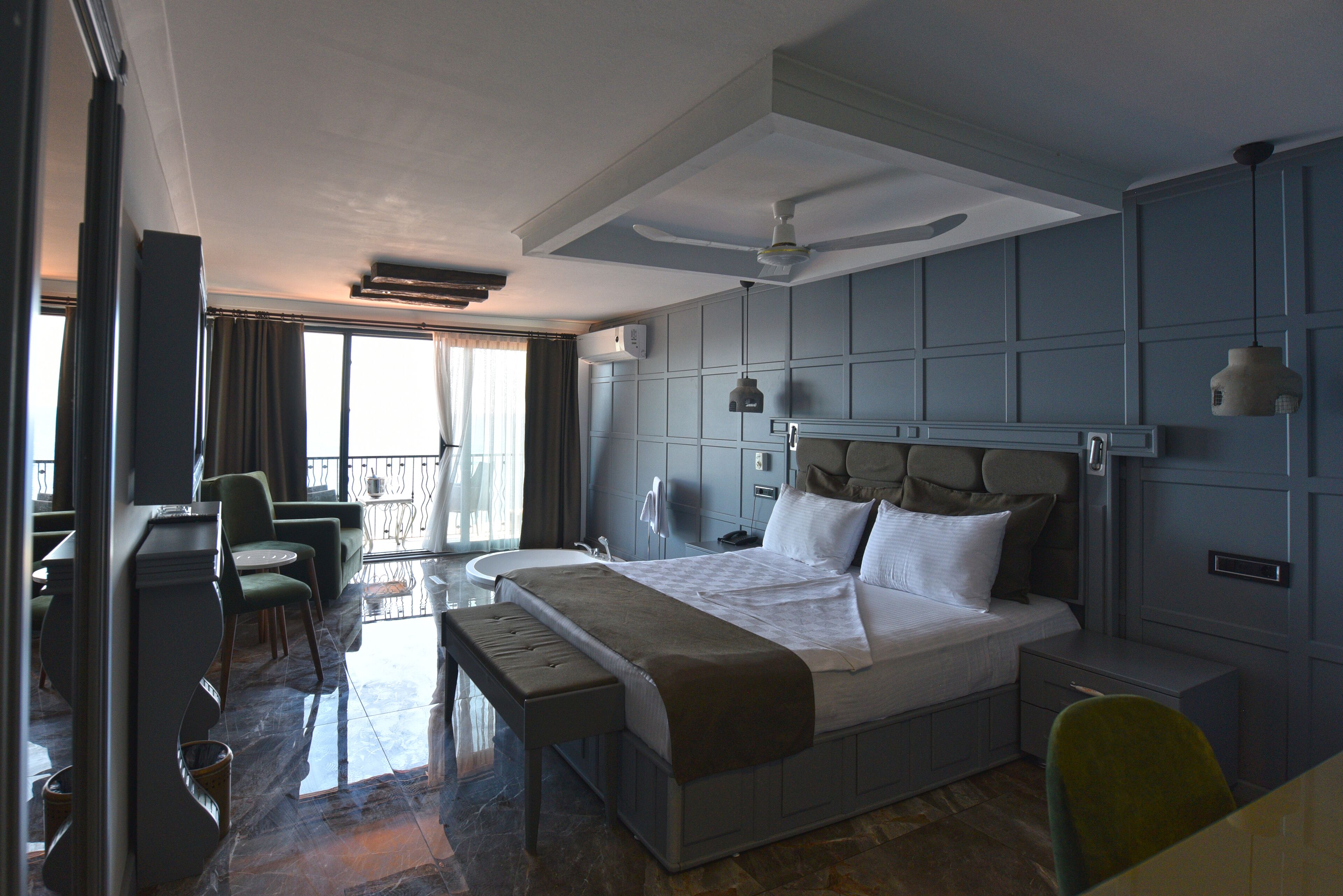 deluxe penthouse, 1 bedroom, balcony, sea view | minibar, in-room safe, individually decorated, desk