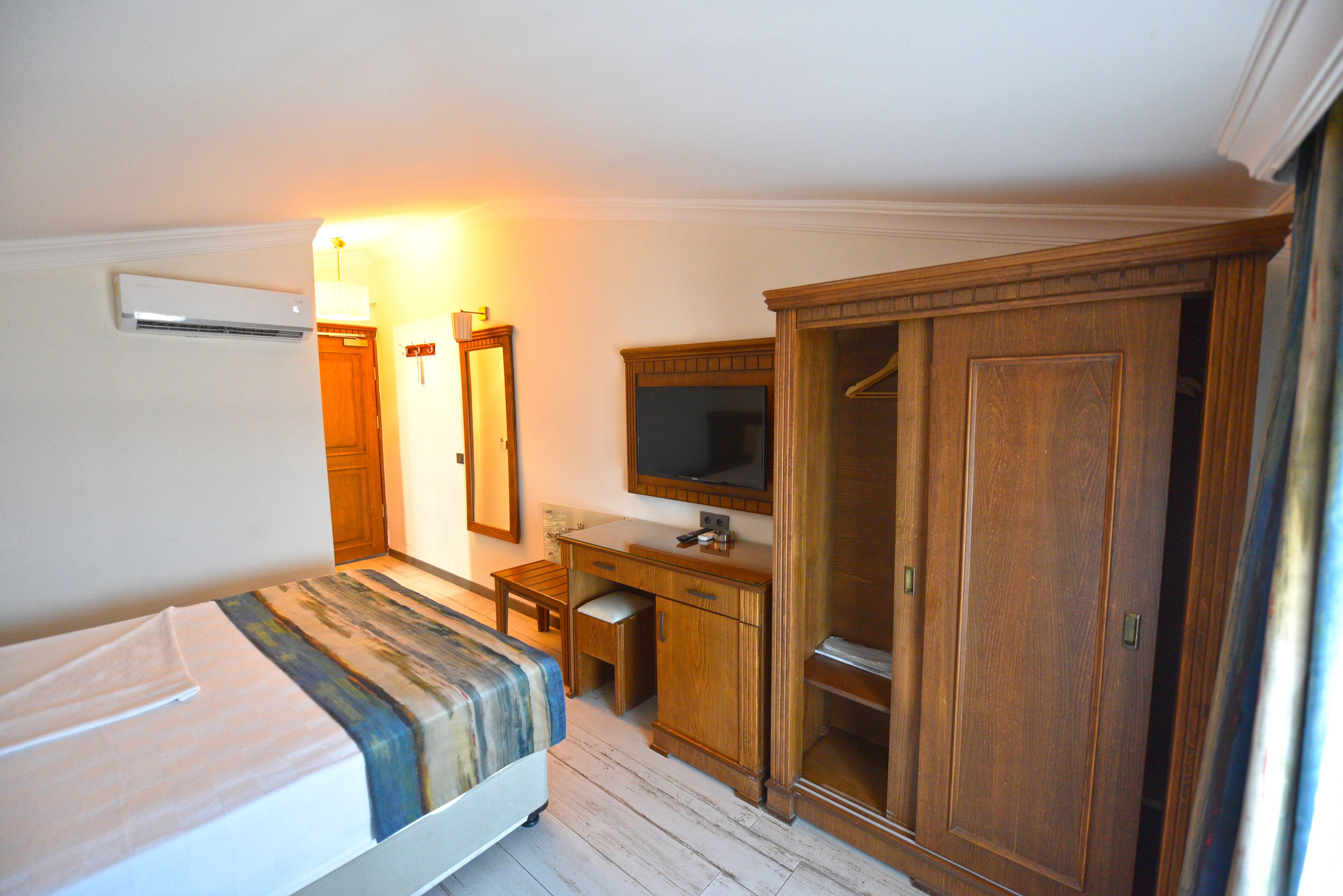 double or twin room | minibar, in-room safe, individually decorated, desk