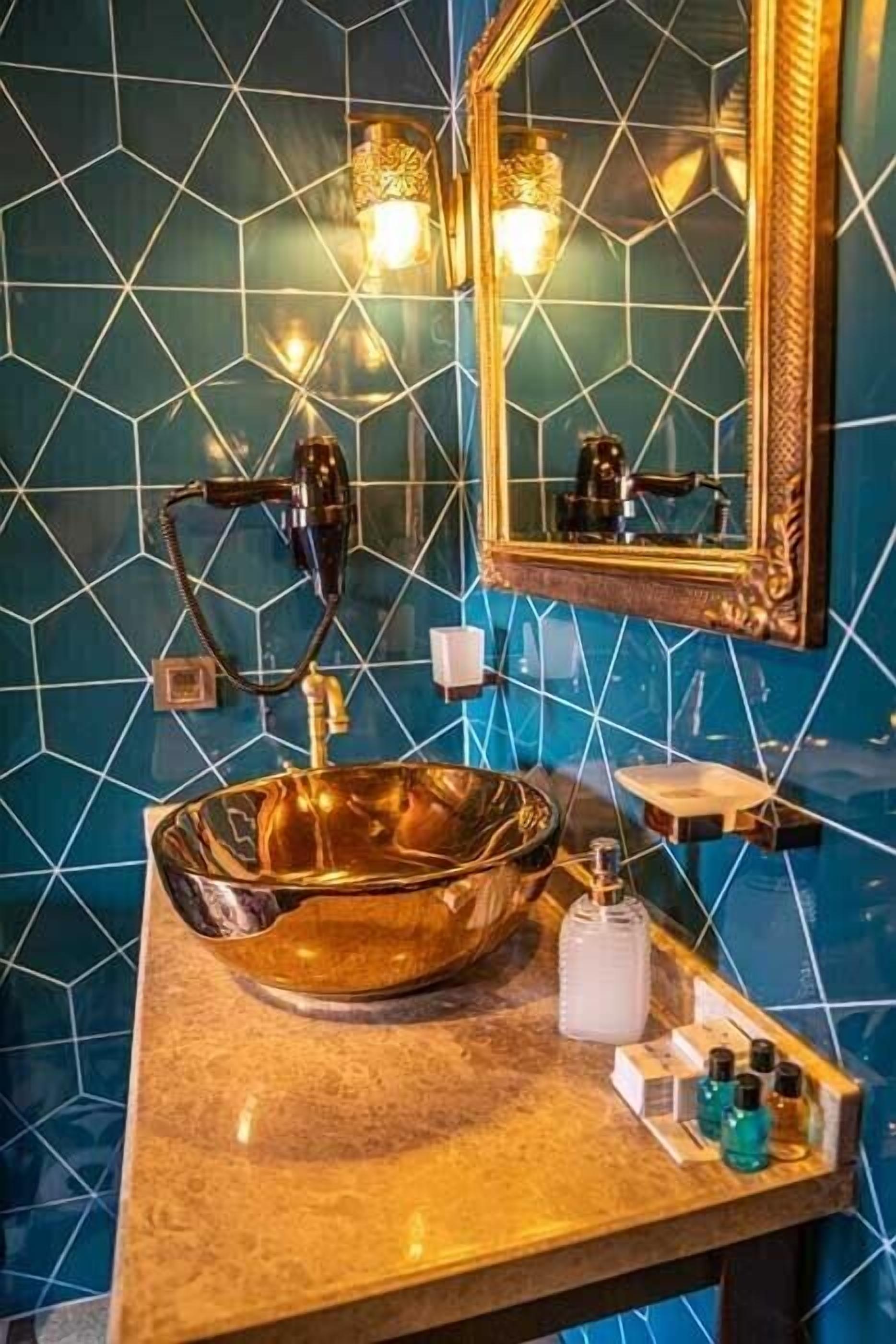 luxury penthouse | bathroom | shower, free toiletries, hair dryer, slippers