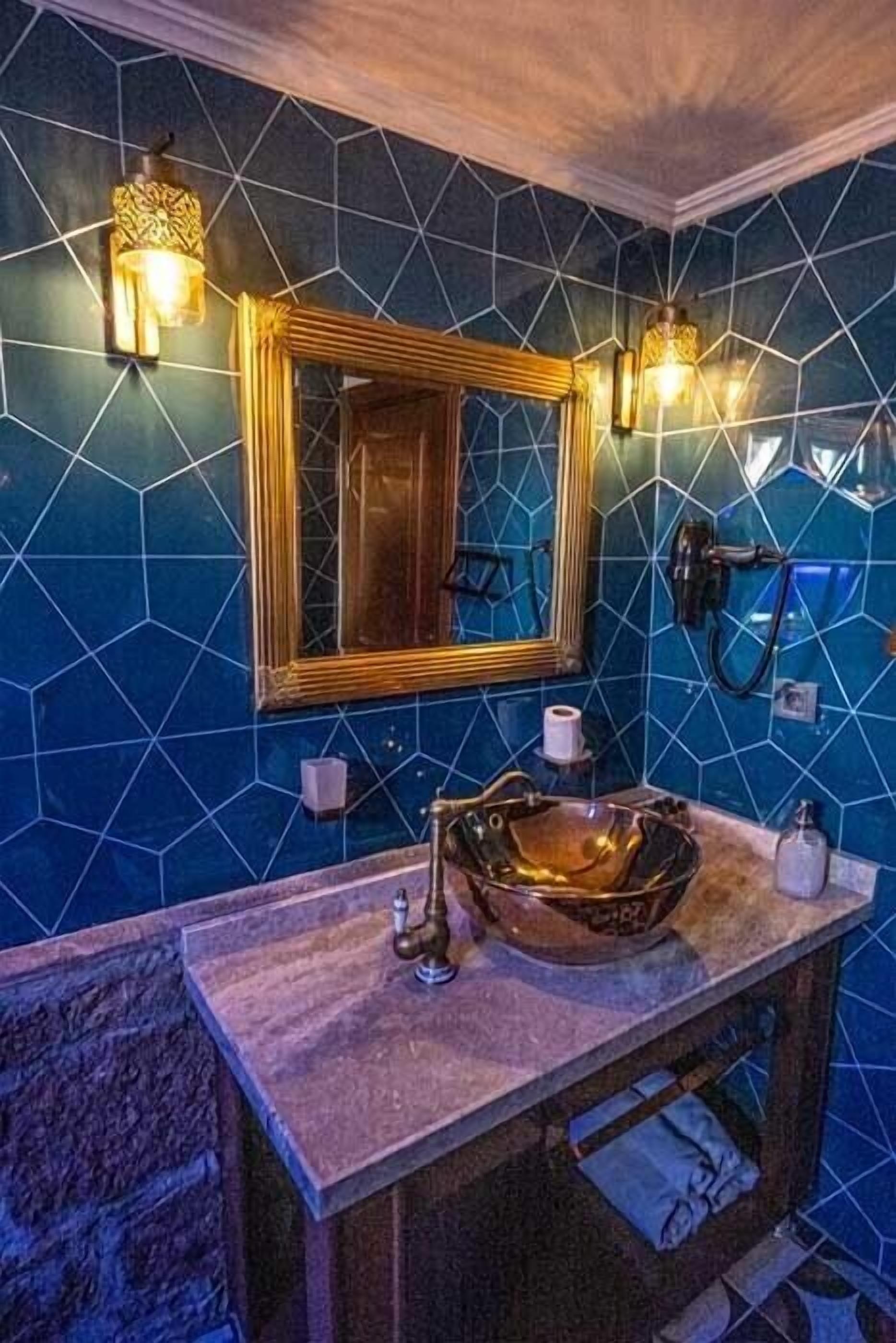 luxury penthouse | bathroom | shower, free toiletries, hair dryer, slippers