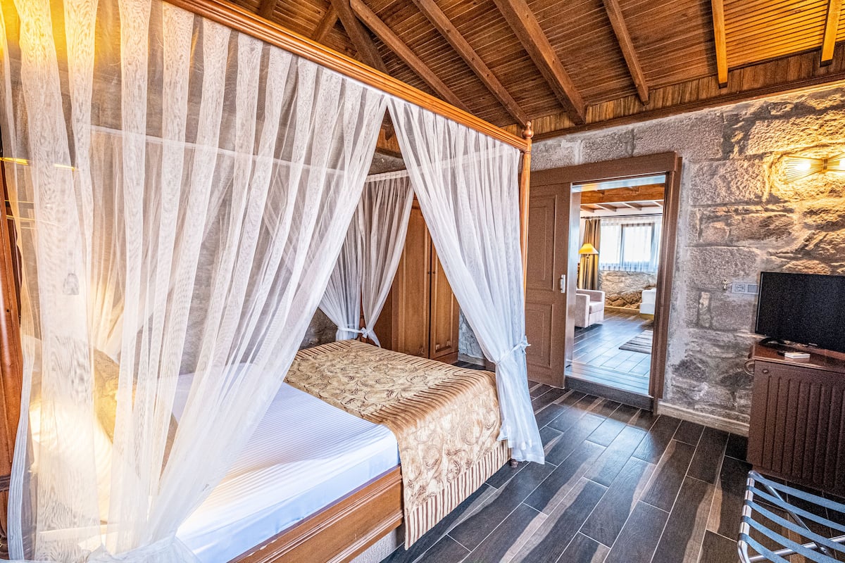 luxury penthouse | minibar, desk, laptop workspace, rollaway beds