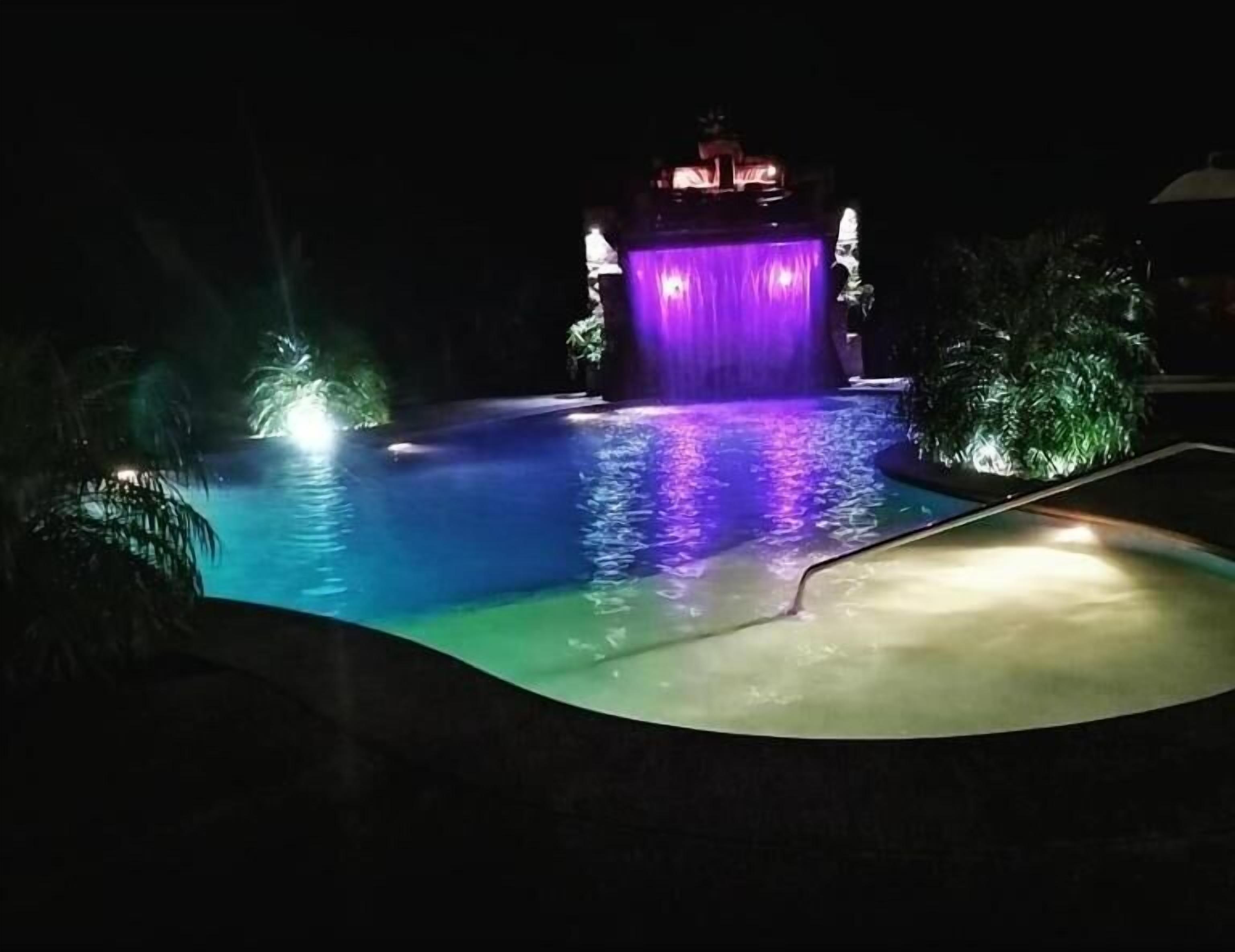 Seasonal outdoor pool, open 7:00 AM to 10:00 PM, pool umbrellas