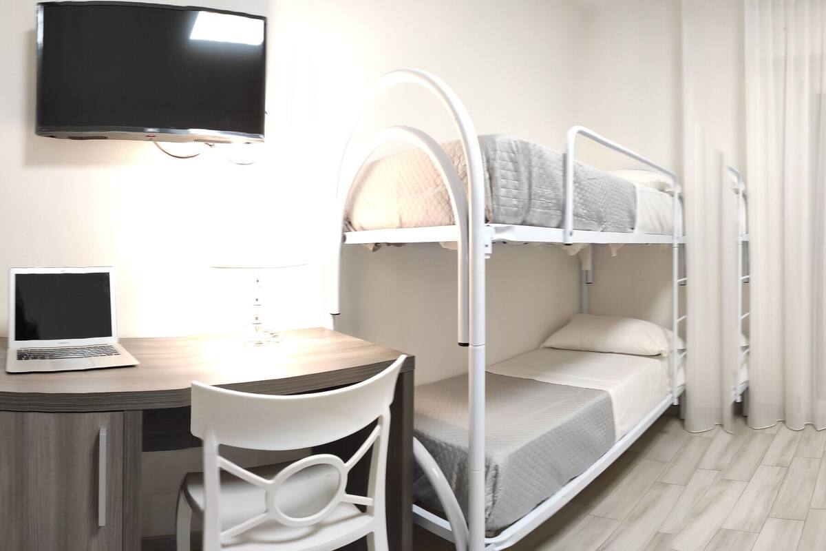 Desk, free WiFi, bed sheets