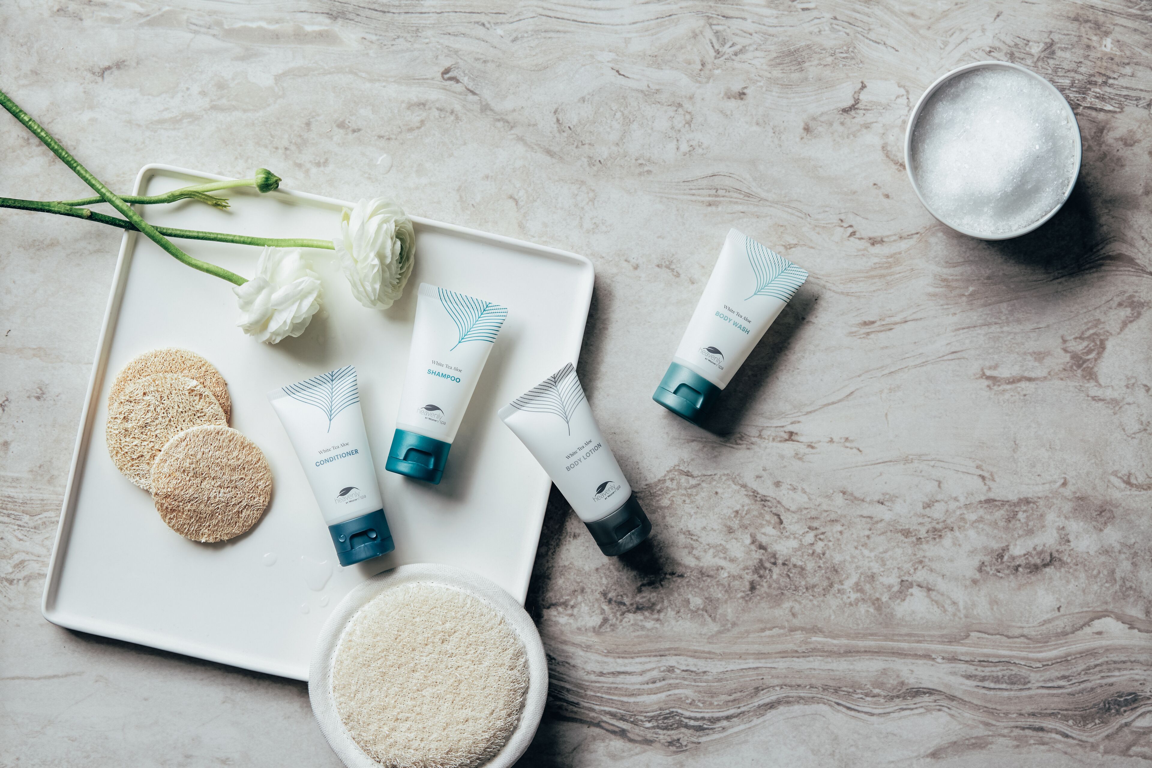 separate bathtub and shower, rainfall showerhead, designer toiletries