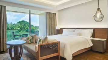 Premium bedding, down comforters, pillowtop beds, minibar