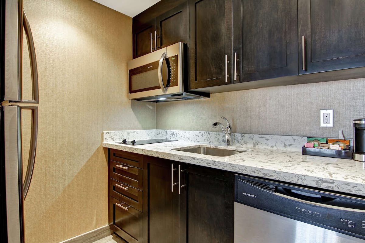 full-sized fridge, microwave, dishwasher, coffee/tea maker