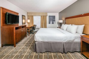 Desk, iron/ironing board, free cots/infant beds, rollaway beds - Richmond Inn & Suites Trademark Collection Wyndham (Baton Rouge)