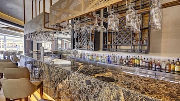 9 bars/lounges, poolside bar