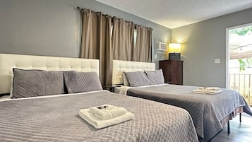Estudio económico, varias camas, cocineta, en el área del jardín | Ropa de cama de alta calidad, wifi gratis y ropa de cama