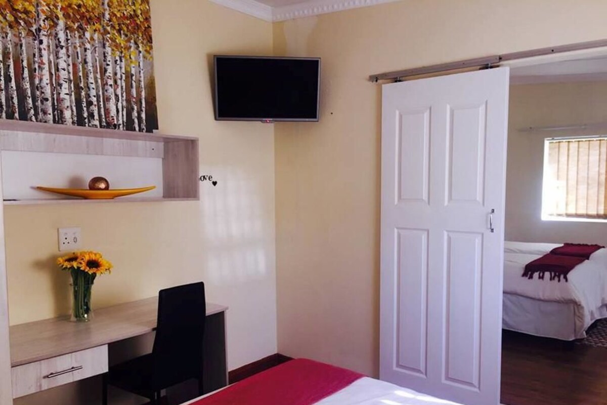 Family Room, 2 Bedrooms | Desk, iron/ironing board, free cots/infant beds, free WiFi