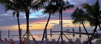 The Harvey Nicole: Modern Caribbean Ocean Front Condo Grand Cayman.