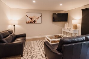 Apartment, 2 Bedrooms | Living room | 80-cm flat-screen TV with digital channels, LCD TV