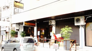 A storefront with a sign reading "URBANTEL".