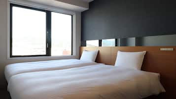 Twin Room | Down duvets, desk, blackout curtains, soundproofing