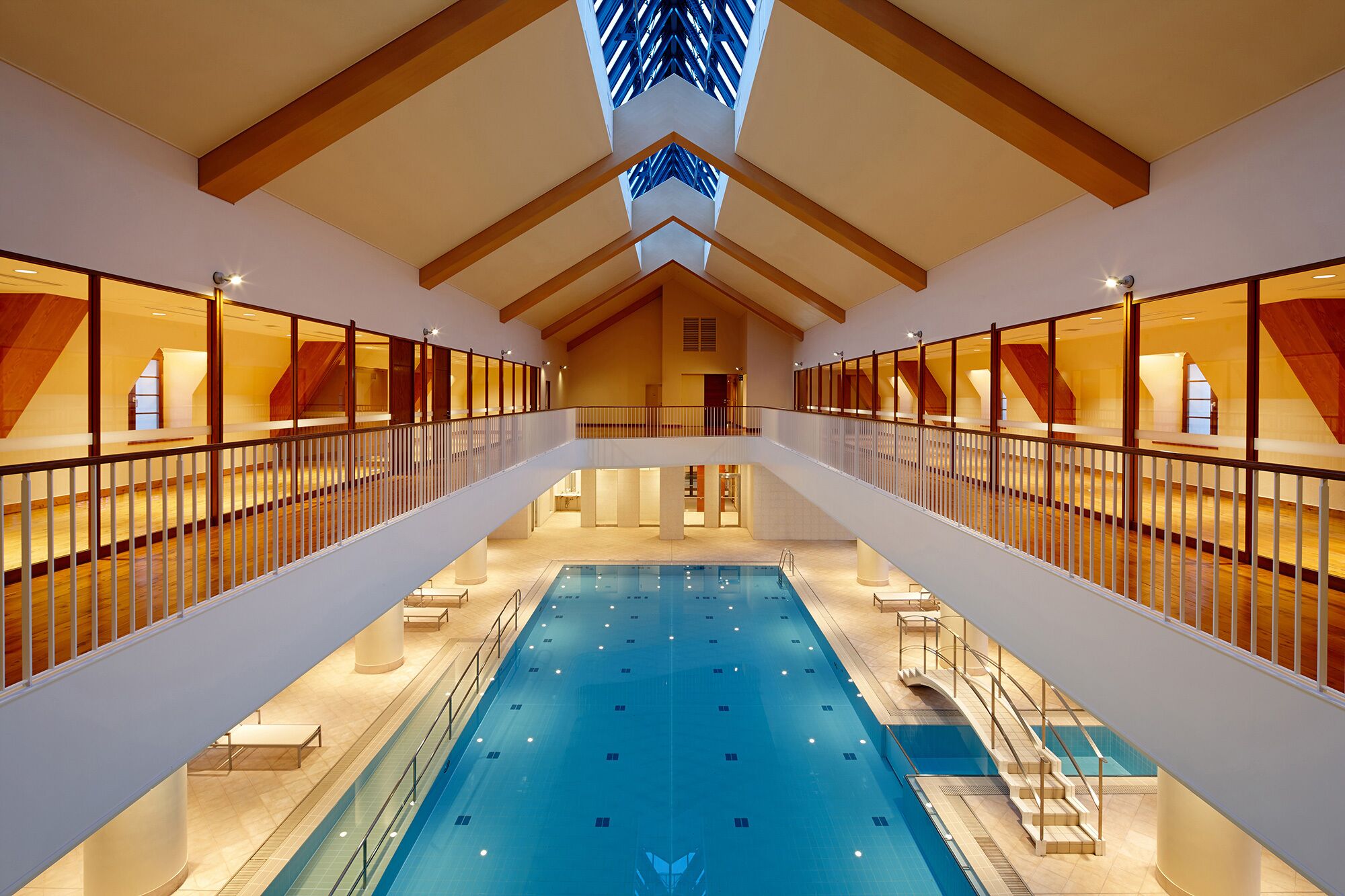 indoor pool, seasonal outdoor pool, pool umbrellas