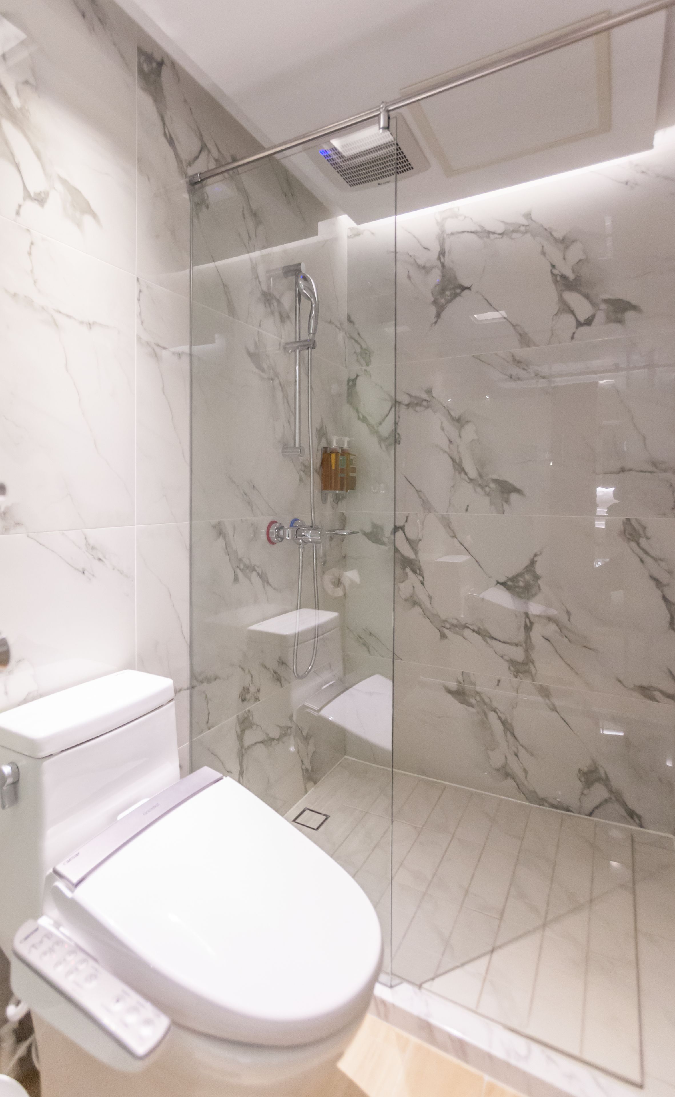 shower, hair dryer, slippers, bidet