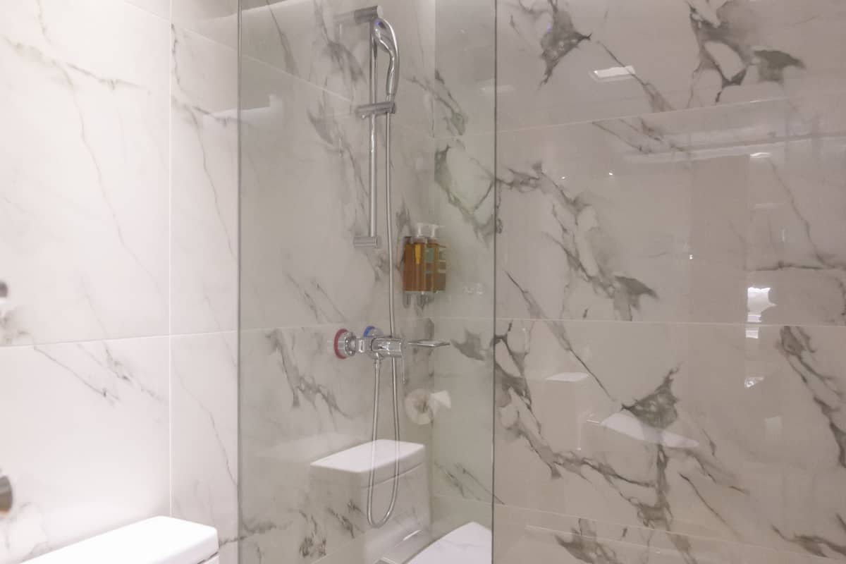 shower, hair dryer, slippers, bidet