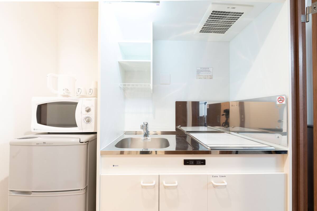 Double Room | Private kitchen | Fridge, microwave