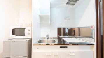 Double Room | Private kitchen | Fridge, microwave