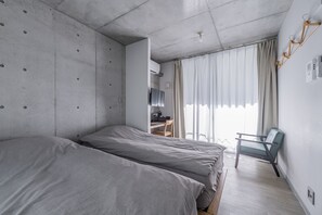 Chambre Économique avec lits jumeaux, 2 lits une place, non-fumeur, baignoire