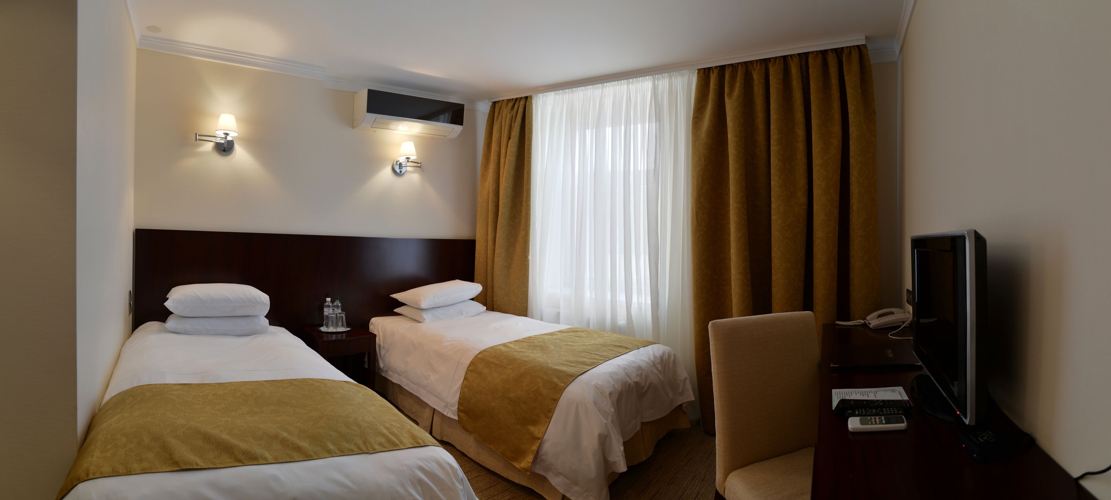 standard twin room (special offer) | in-room safe, desk, laptop workspace, blackout curtains