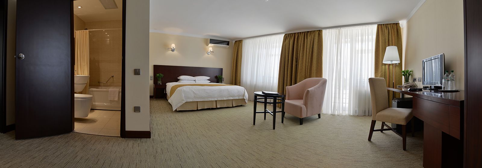 suite | in-room safe, desk, laptop workspace, blackout curtains