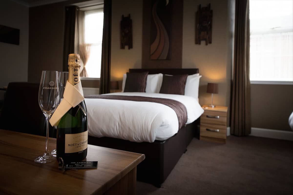Family Quadruple Room | Desk, iron/ironing board (on request), cribs (surcharge), WiFi (free)