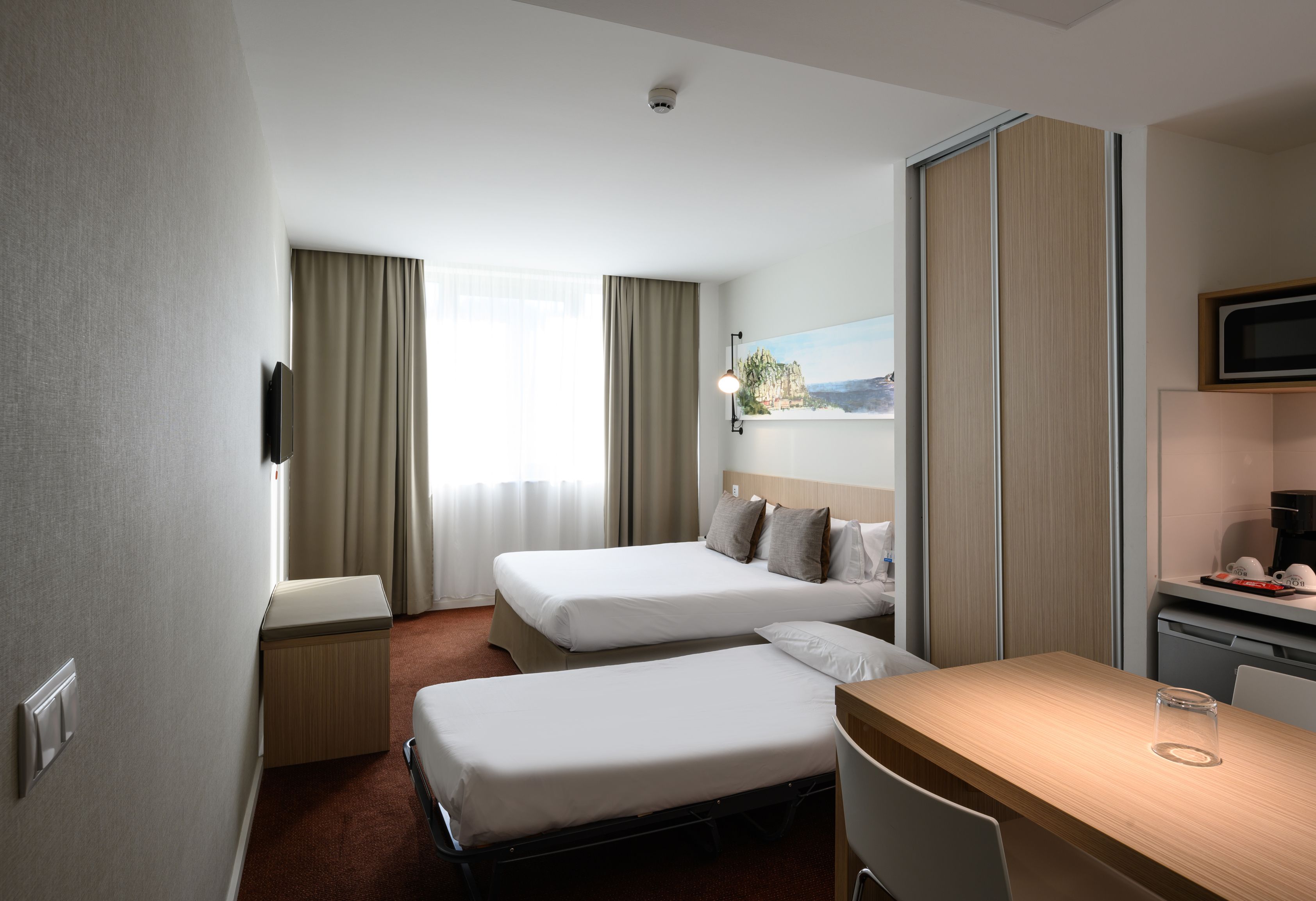 triple room (with parking included) | minibar, desk, laptop workspace, blackout curtains