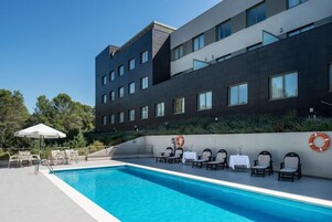 Seasonal outdoor pool, pool umbrellas, sun loungers
