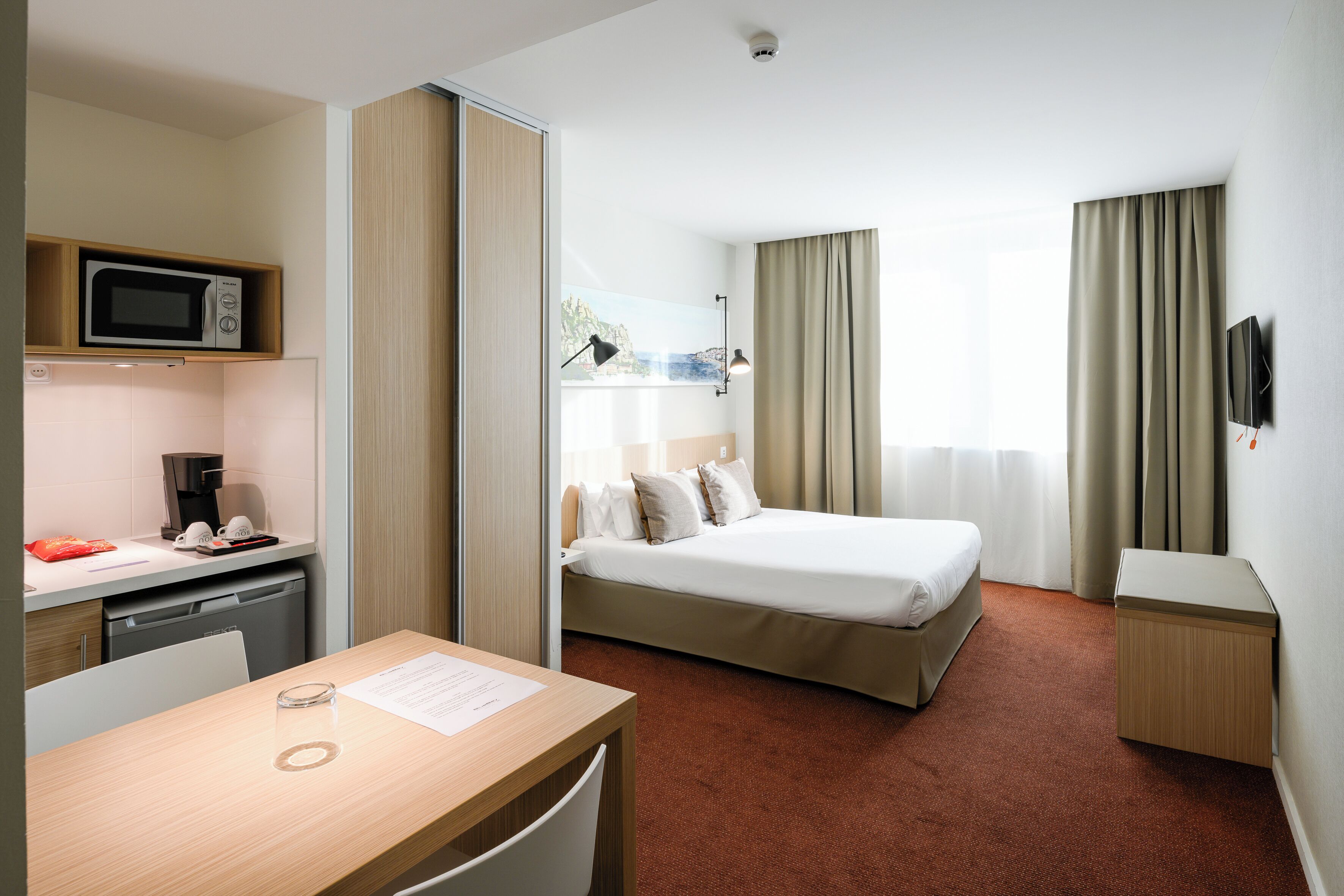 minibar, desk, laptop workspace, blackout curtains