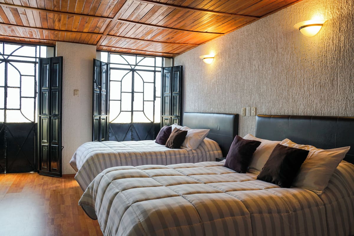 room, 2 double beds | in-room safe, desk, iron/ironing board, free wifi