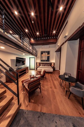 Presidential Double Room, Bathtub | Living area | 42-inch Smart TV with cable channels, TV, fireplace - Domingo Santo Hotel Boutique - Adults Only (Mexico City)