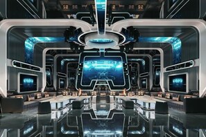 A futuristic interior with a central control panel, multiple screens, and a reflective floor. - Gophoe Hotel (Huizhou City)