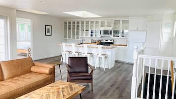 Deluxe Three Bedroom with Kitchen | Living area | 50-inch flat-screen TV with cable channels, TV, fireplace