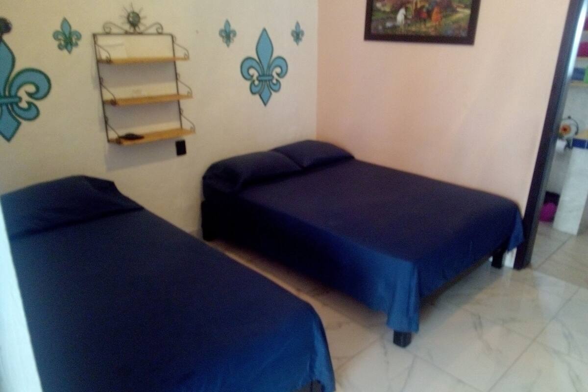 Triple Room | Desk, iron/ironing board (on request), cribs (free), WiFi (free)