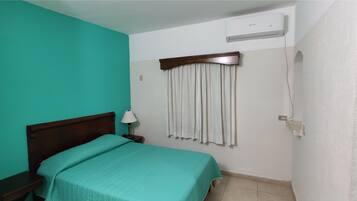 Superior Room | Desk, iron/ironing board, bed sheets