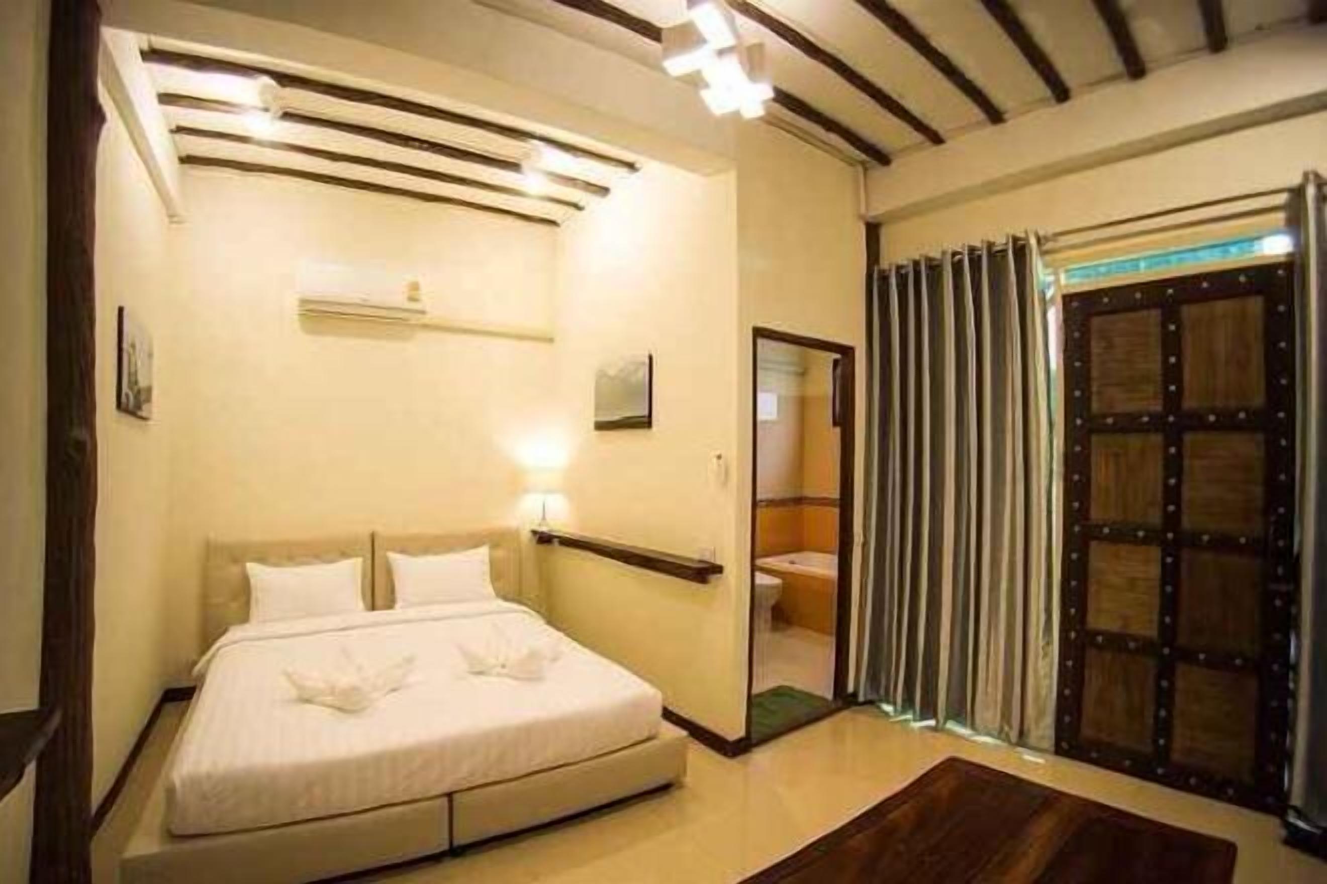 Desk, blackout drapes, rollaway beds, free WiFi