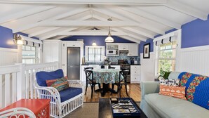A cozy interior with a dining area, kitchen, and seating space. - Best Beach Location in Santa Monica! Our Summer Stretches Through Fall! (Santa Monica)
