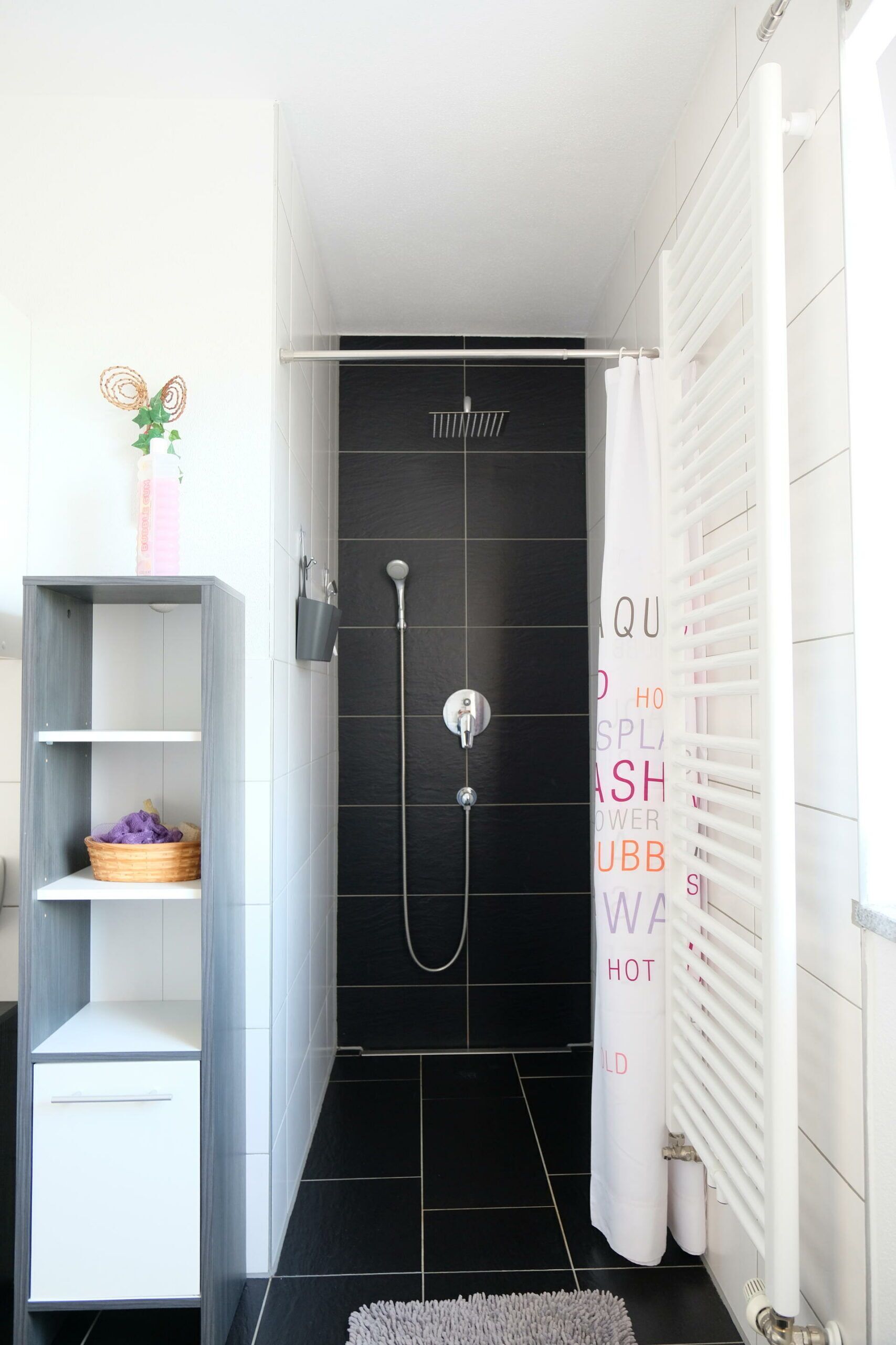 Bathtub, hair dryer, towels, soap
