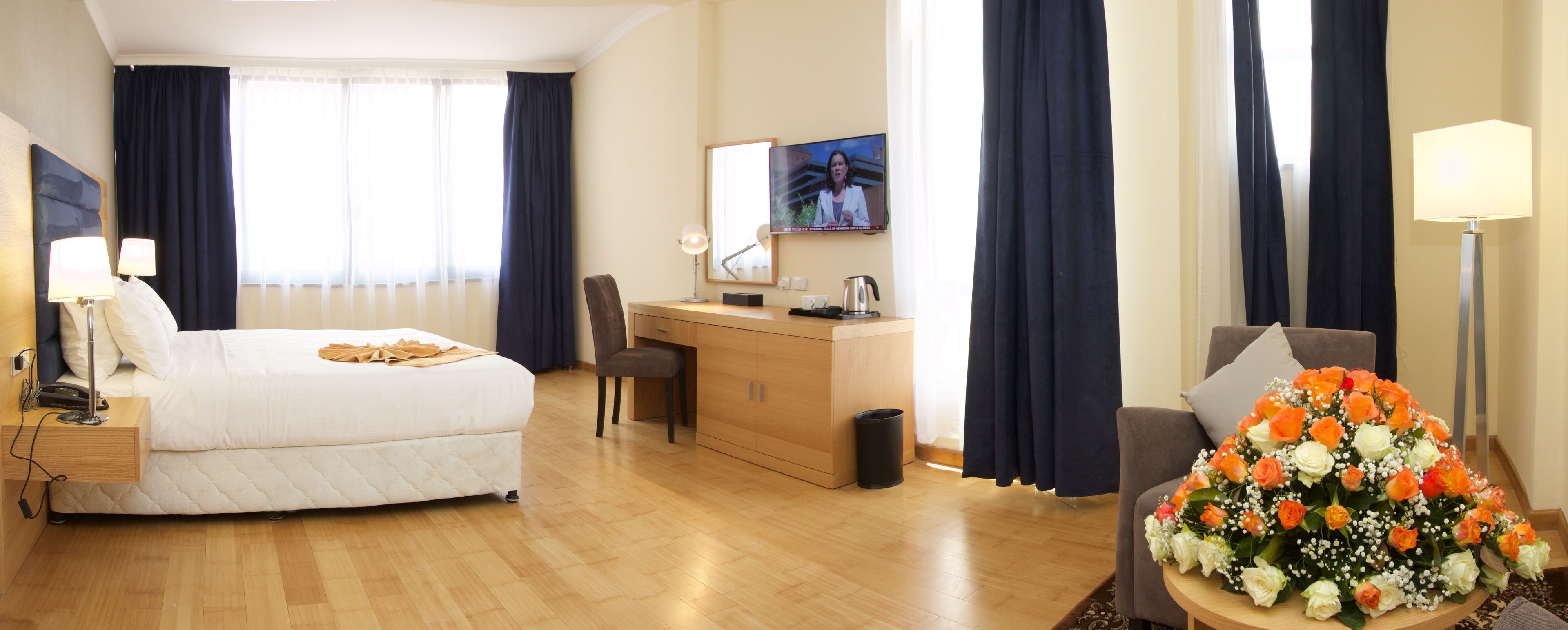 deluxe suite, accessible | living area | 42-inch flat-screen tv with satellite channels, tv