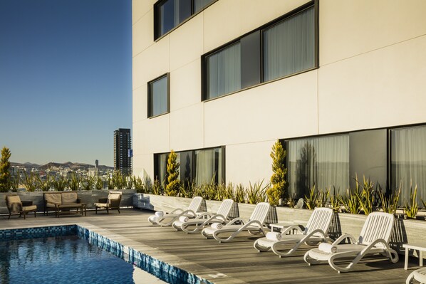 Outdoor pool, pool loungers