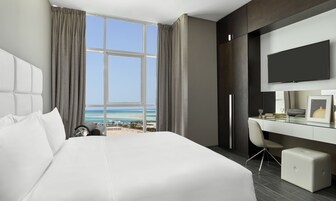 Premium bedding, in-room safe, individually decorated
