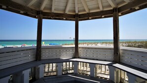 A wooden gazebo with a view of the beach and ocean. - Townhouse condo. 3 min walk to private beach.  1 min walk to pool.  (Destin)