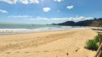 On the beach, sun-loungers, beach towels