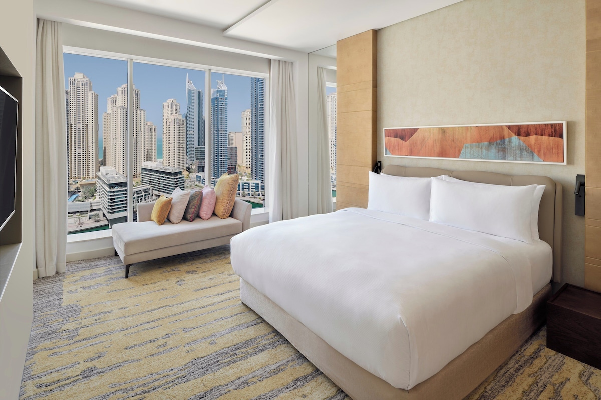 Premium bedding, down duvets, pillow-top beds, in-room safe