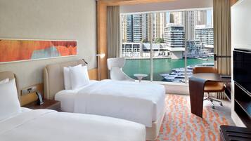 Premium bedding, down duvets, pillow-top beds, in-room safe